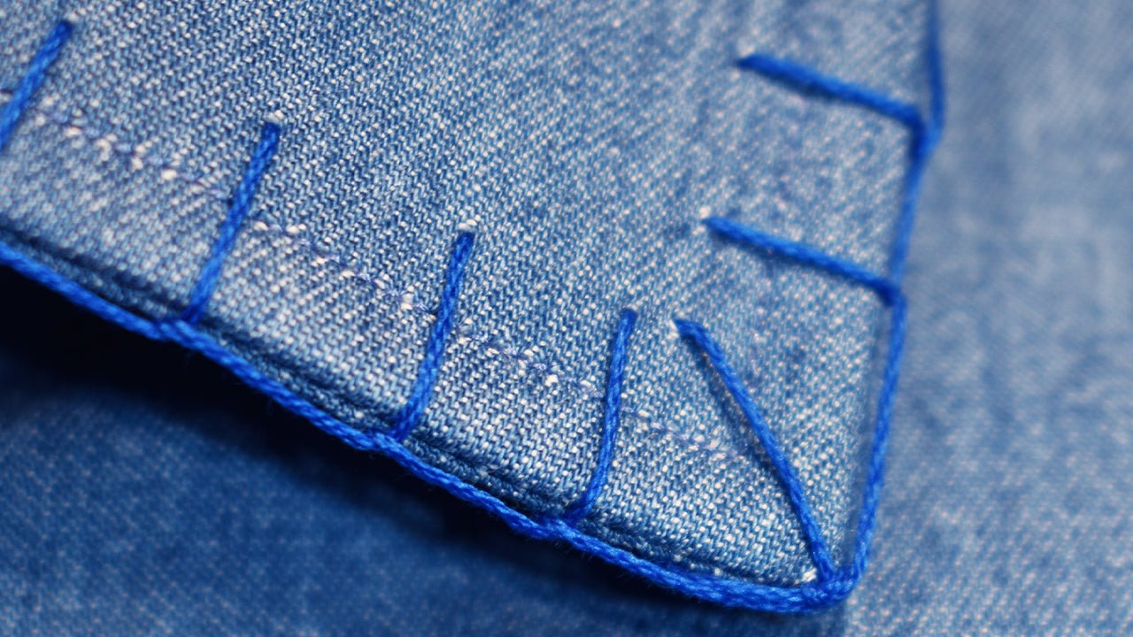 Camicia in denim sartoriale: L'arte del ricamo a mano e del lavaggio washed - Valensia